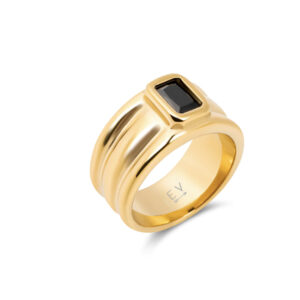 A gold ring with black stone on it